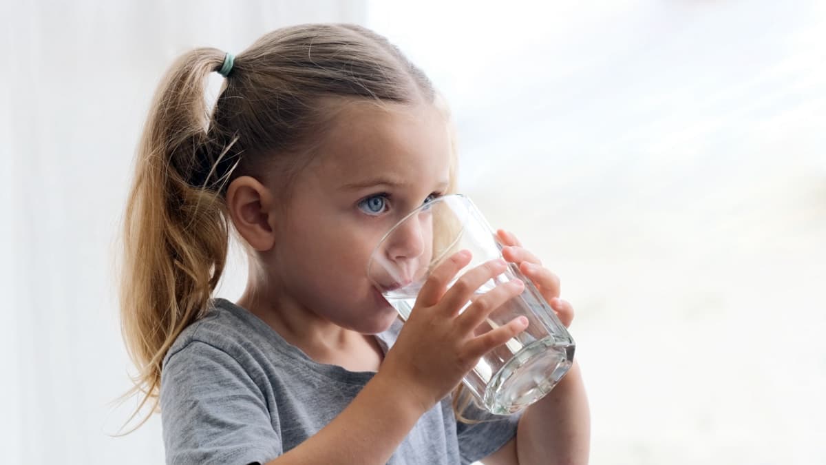 Child drinking pure water