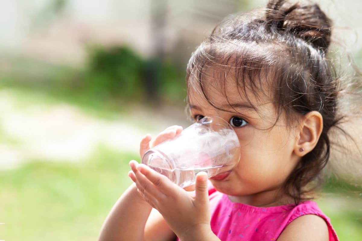 Happy child with clean water